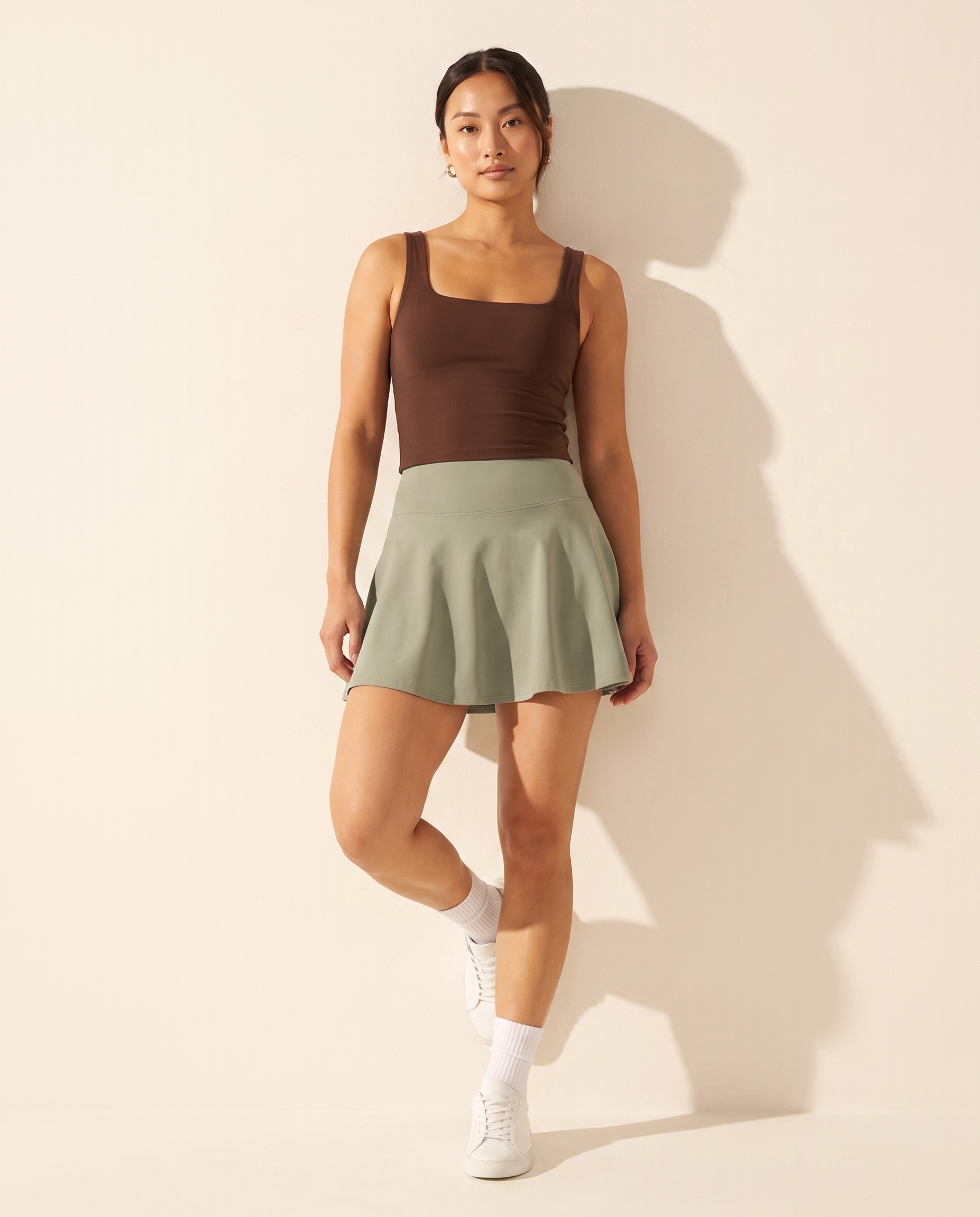 Sage No-Rub Skort - leaning against wall